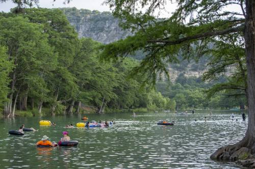 People floating on the river at Garner State Park in Texas