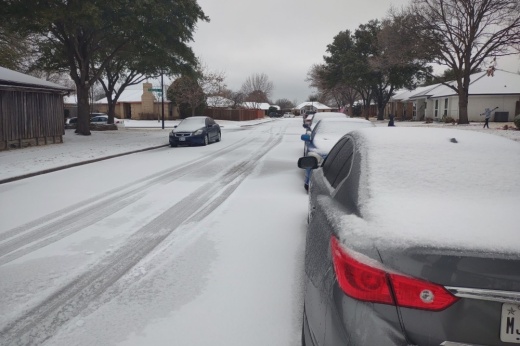 Icy street with cars