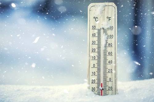 A thermometer in the snow.