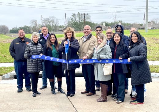 Sugar Land City Councilmembers and staff prepare to cut the ribbon on the Greatwood Village Drainage project on Jan. 31, 2023. (Courtesy City of Sugar Land)