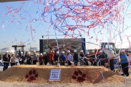 Great Wolf Lodge CEO Murray Hennessy, Webster Mayor Donna Rogers, and several city and Great Wolf Lodge officials celebrate the groundbreaking for the resort expected to open in 2024. (Courtesy city of Webster)