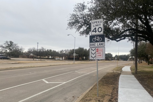 Traffic sign next to bike lane