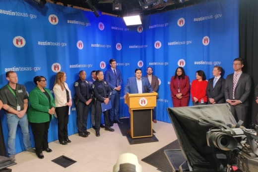 City and police leaders including Austin Police Association President Thomas Villarreal, center, gathered Feb. 9 to announce a tentative four-year police contract agreement. City Council went on to consider that plan against a one-year alternative. (Ben Thompson/Community Impact)