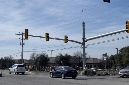 Motorists traverse the newly installed traffic light at Northwest Military Highway and Pond Hill Road in Shavano Park. Made operational by Feb. 22, the stop light is part of a state-supported improvement project on Northwest Military. (Courtesy city of Shavano Park)