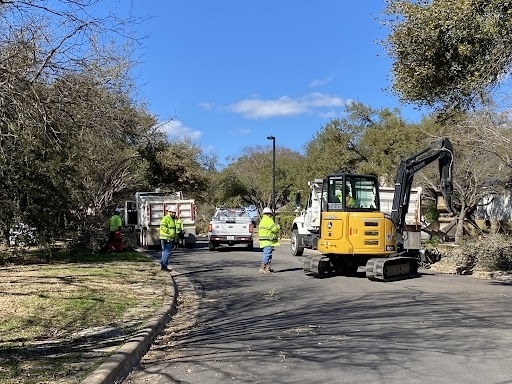 Work crew removing storm debris