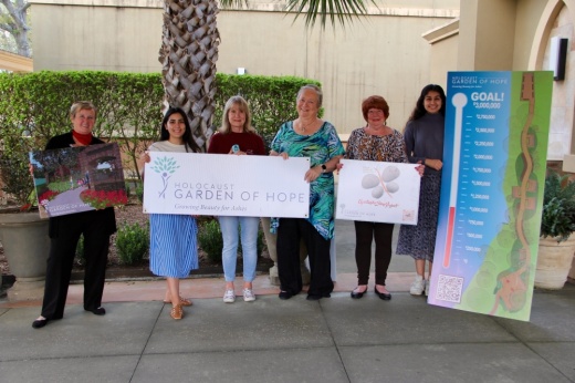 Rozalie Jerome (left) stands with members of the Holocaust Remembrance Association to promote several of the Kingwood nonprofit's initiatives. (Wesley Gardner/Community Impact)