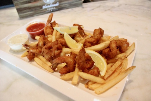 Shrimp Boat ($13.99) Eight pieces of fried shrimp served with french fries, lemon wedges, cocktail sauce and tartar sauce. (Emily Lincke/Community Impact)