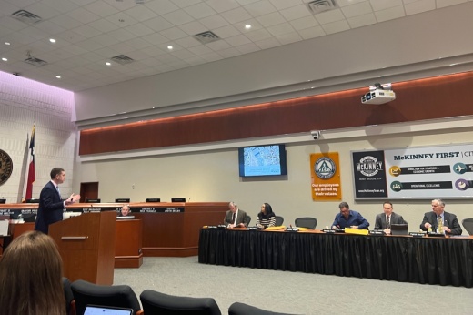 Michael Quint presenting to city council members