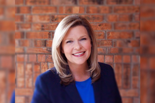headshot of shontel mays wearing blue shirt and black blazer