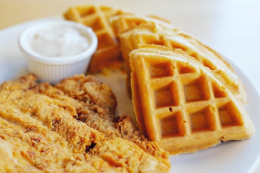 A picture of chicken and waffles at Jam + Toast in Frisco