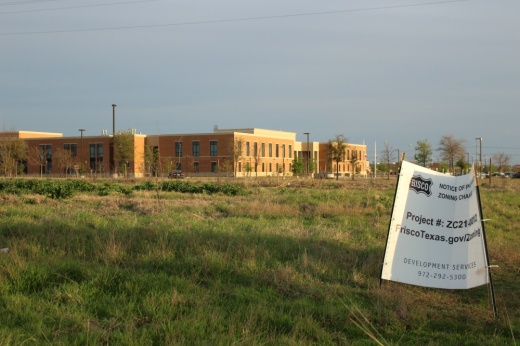 A photo of a zoning sign in the land where the Oasis at Cobb Hill is proposed