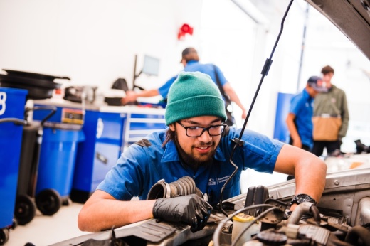 Student fixing car