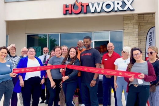 Photo of a ribbon-cutting ceremony at the Hotworx Hutto location