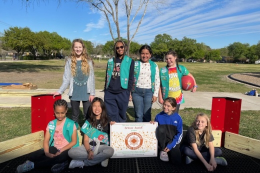 Members of a girl scout troop stand together