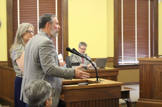 Fulshear Mayor Aaron Groff speaks at a podium