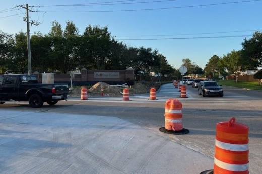 traffic barrels along a league city street
