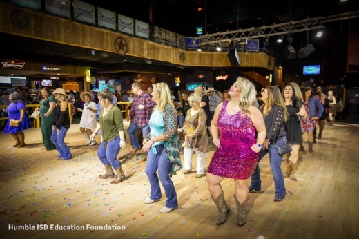 The Humble ISD Education Foundation’s annual Boots & Bling event will include a night of country dancing, ax throwing, bull riding and corn hole, among other activities. (Courtesy Humble ISD Education Foundation)