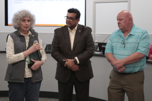 Former Missouri City Employee Millie Holifield (left) speaks after being honored for her 33 years of service by the Missouri City Council and Public Works Director Shashi Kumar (center). (Jack Dowling/Community Impact)