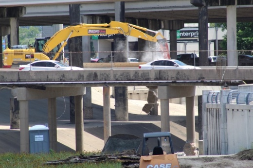 Construction crews work on bridge construction