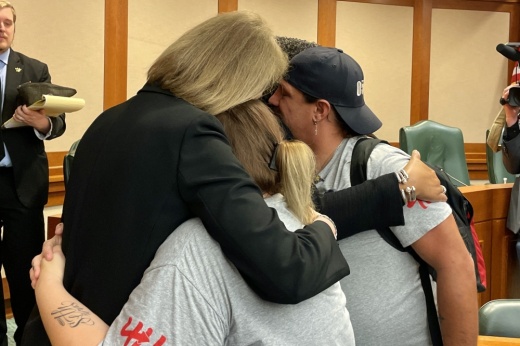 Nikki and Brett Cross, the parents of 10-year-old Uvalde victim Uziyah Garcia, hug Democratic state Reps. Vikki Goodwin and Rhetta Andrews Bowers.