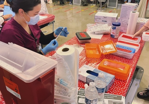 a vaccine clinic in a school gym