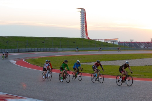 riders bike around the track