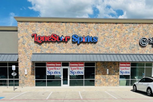 Exterior of Lone Star Spirits with sign