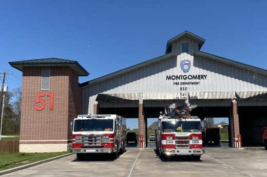 a photo of the Montgomery Emergency Service District No. 2 building with fire trucks in the front