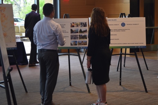 two people look at the plans for ATP