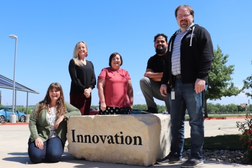 From left to right: Web Developer Carly Kubacak, Chief Operations Officer Claire Love, Developer Manager Jennifer Bland, UX Developer Jose Salazar and Operations Director David Ludwick. (Photos by Jay Jones/Community Impact)