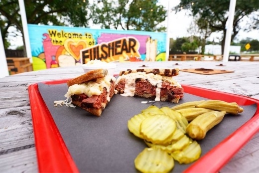Barbecue on a tray with pickles