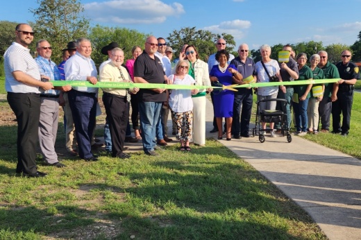 City officials held a ribbon-cutting ceremony May 22 for the opening of the new trail. (Jarrett Whitener/Community Impact)