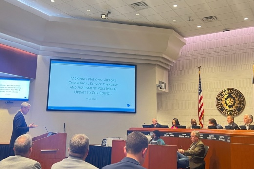 Edward Shelswell-White presenting to city council members in the council chambers
