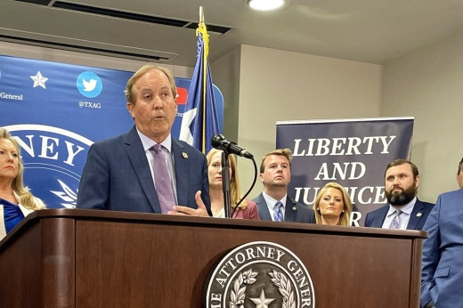 Texas Attorney General Ken Paxton reads from prepared remarks about his possible impeachment on May 26.