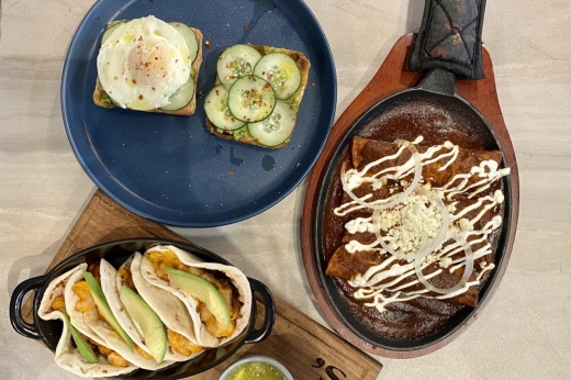 Three of the entrees at Simona's Bistro include mole enchiladas ($25), shrimp tacos ($24) and avocado toast ($18). (Cassandra Jenkins/Community Impact)