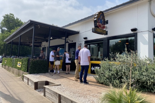 La Barbecue storefront with customers lining up outside