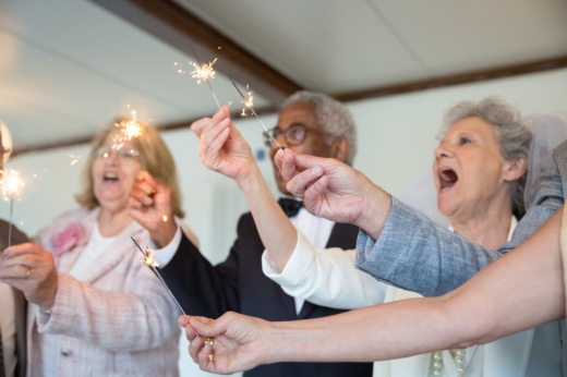 people hold sparklers