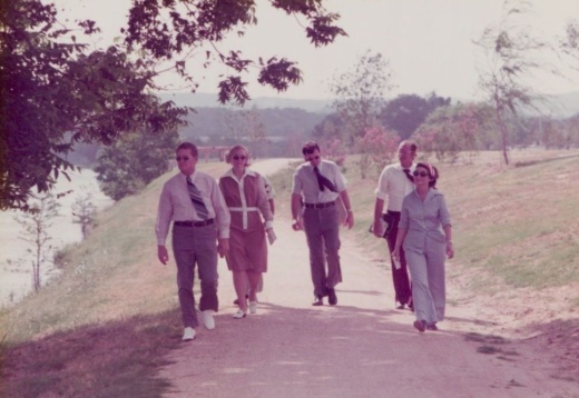 People walk along the trail on a sunny day