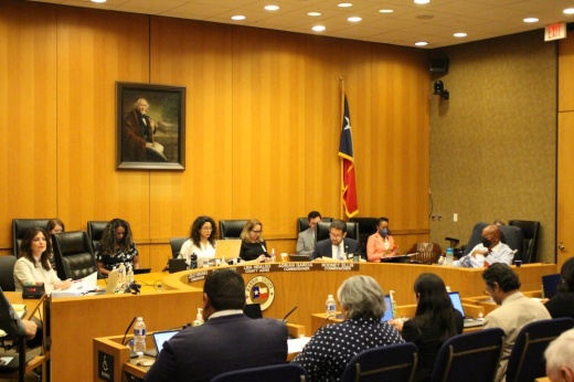 The photo shows the Harris County Commissioners Court meeting on June 27.