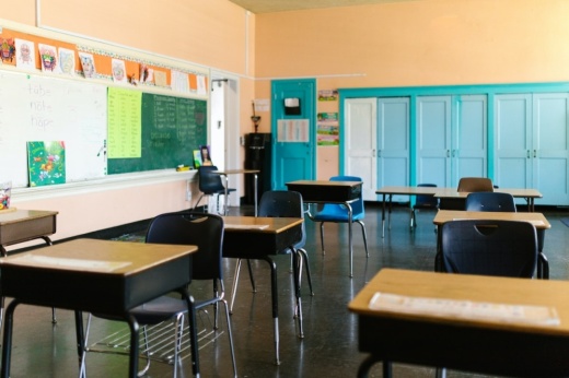 Empty seats in a classroom.