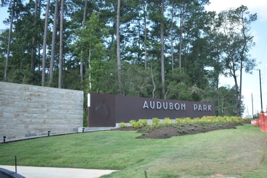 A large sign before the entrance of the Audubon development reads Audubon Park