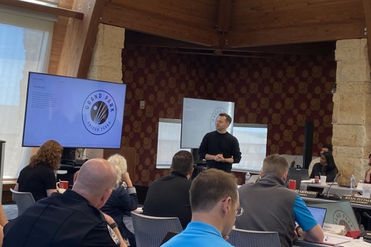 Man giving presentation on Grand Park in Frisco