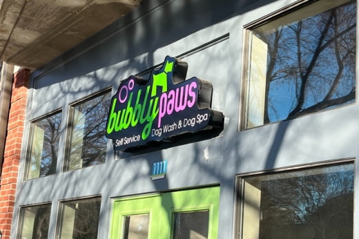 The photo shows a Bubbly Paws sign