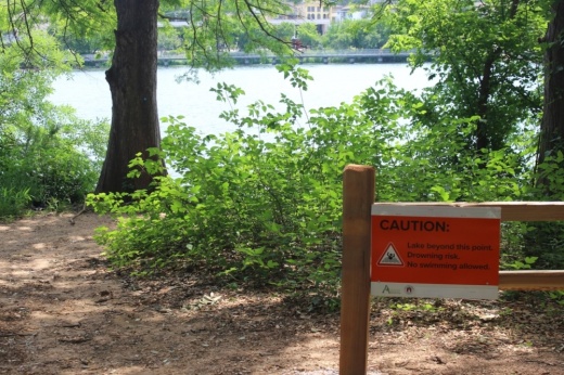Temporary safety features were installed along the trail off Rainey Street earlier this year. (Ben Thompson/Community Impact)