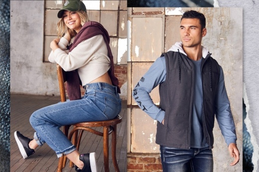 The photo shows a woman and a man modeling Buckle clothing