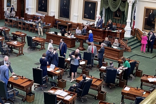 (Center) Sen. Angela Paxton, R-McKinney, hugs Sen. Paul Bettencourt, R-Houston, after the Texas Senate unanimously passed his property tax legislation June 12.