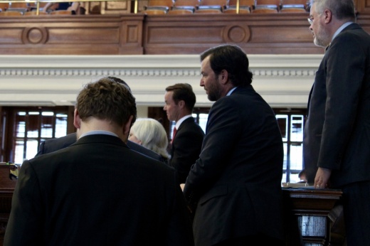 Texas House Speaker Dade Phelan (center) listens as lawmakers debate an $18 billion property tax relief package June 13.