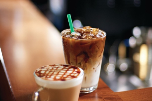 Two Starbucks drinks on a counter