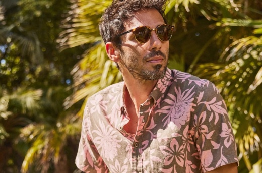 Man in a tropical themed shirt