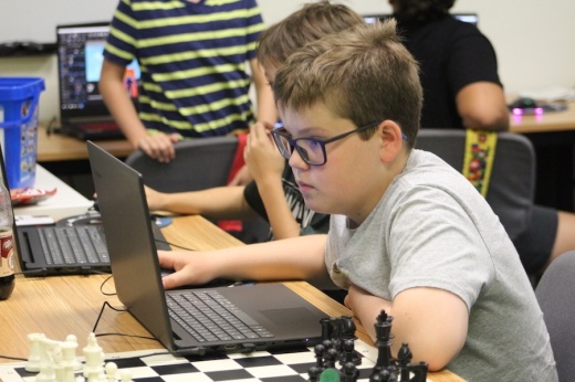 Kids learning about Roblox Studio at Code Ninjas. (Amira Van Leeuwen/Community Impact)